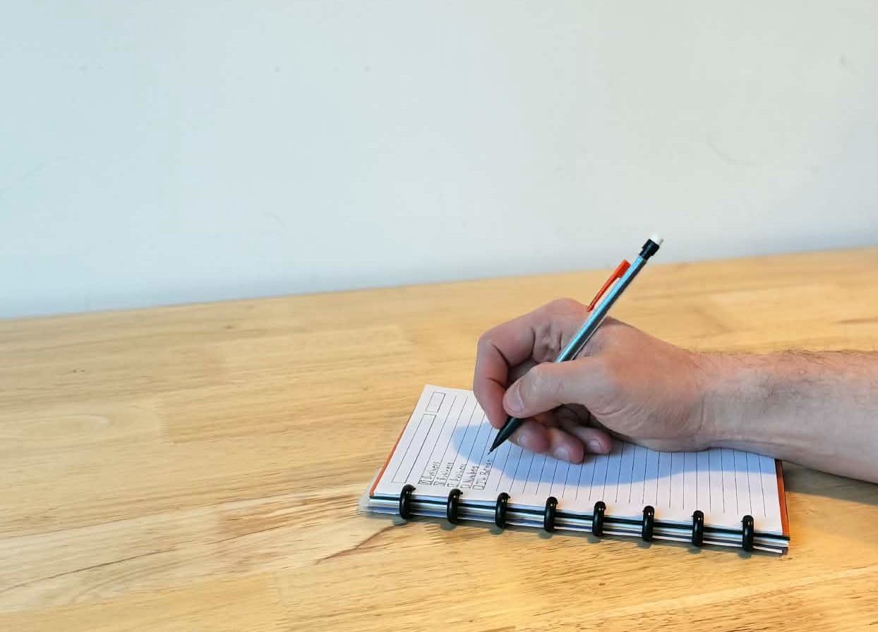 Writing on notebook - cropped horizontal Writing on notebook - cropped horizontal
